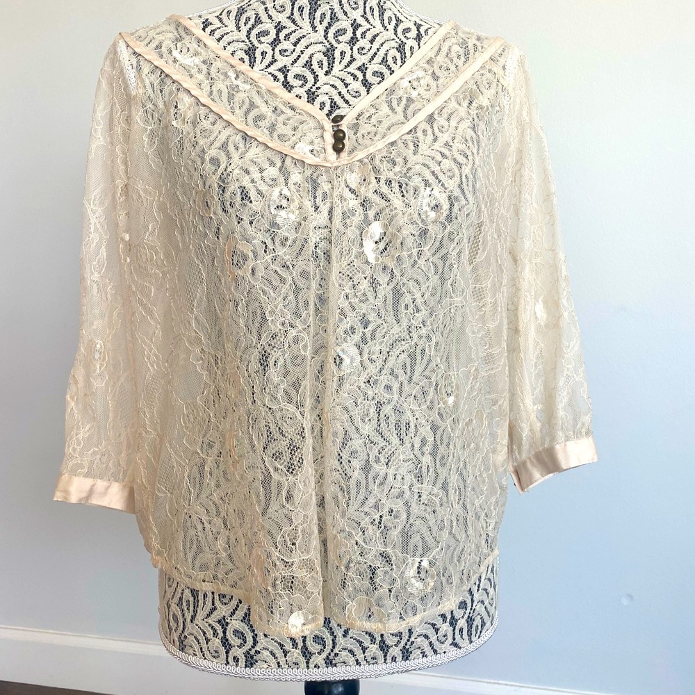 Lace flower patterned blouse with ribbon detailing